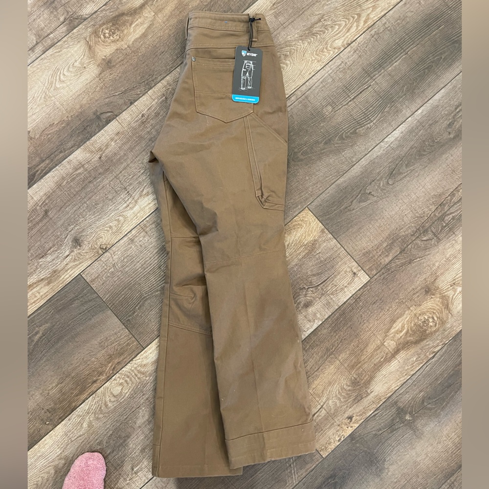 Woman’s KUHL khaki boot cut pants. New with tags. Purchased on Poshmark, too big